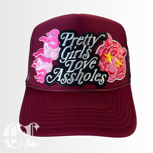 Pretty Girls Love A@$holes Patched Trucker